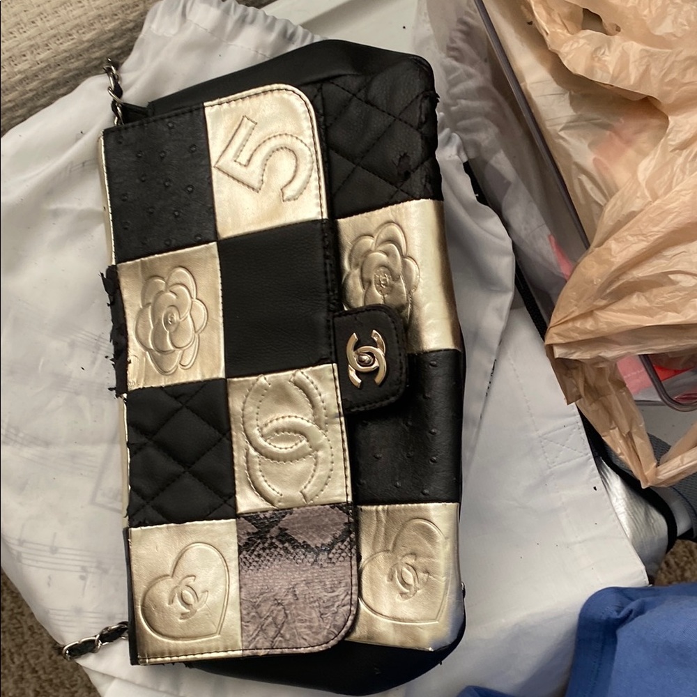 Chanel Black and Gold Quilted Clutch